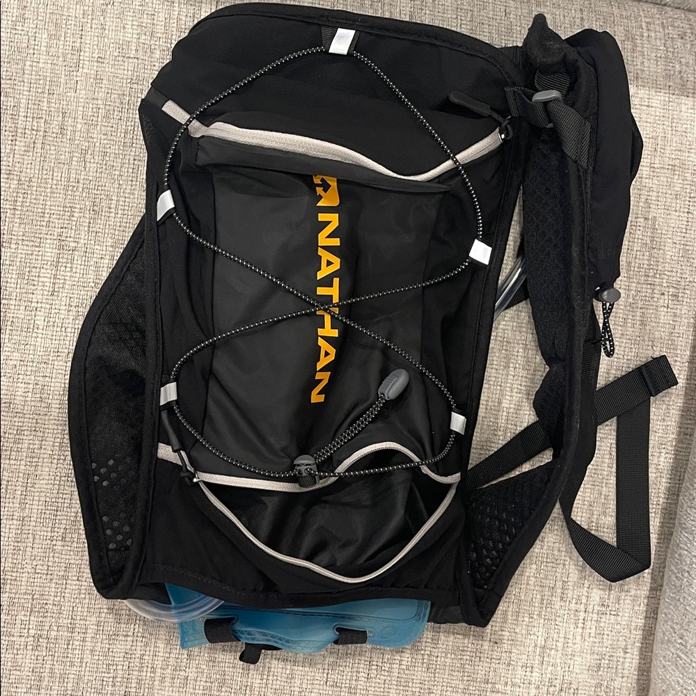 Nathan Black Backpack with Yellow Logo